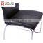Square wooden table and leather chairs