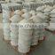 Cement block base stone for clothesline pole