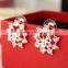 New Brand Design Hollow Out Flower Bow Stud Earrings With Shiny Crystal Simple Metal Ear for Women Earrings Jewelry