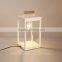a shop table lamp with glass and wood for hotel made in china