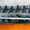 Manufacture snowmobile tracks for harvest machine