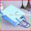 mickey mouse ligh blue paper bag with blue handle rope