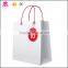 Big size clothes and gift package shopping cartoon paper bag with ABS handles