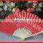 Red hand paper fan made from Zhejiang China
