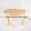 gold leaf and branches design cake stand