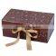 Fancy foldable cosmetic paper box with ribbon closure