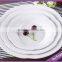 white flower shaped plates