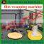 Многофункциональная машина для стягивания пленки вокруг мультипольных пластиковых поддонов