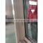 American style vertical sliding window with mosquito netting