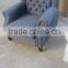 fabric chair and a half with wood trim