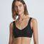 Ladies' santoni seamless knit quick dry & wicking cross back mid support sports bra.