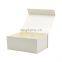 Custom ribbon style luxury ivory color foldable magnet product packing box wholesale