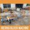 Automatic concrete brick machine