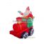 Inflatable santa claus on train