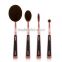 Professional toothbrush shape 4pcs rose gold oval makeup brush set wholesale makeup brushes