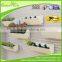 Plastic wall mounted plant and indoor flower pot holder with metal rack