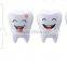 Single tooth shaped plastic toothbrush holder