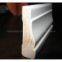 White gesso primed wooden moulding