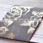 Luxurious gray wedding invitations featured a romantic floral pattern with metallic ink highlights