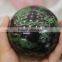 Carved polished epidote gemstone sphere