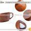 wooden cup of tea with handle