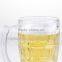 Machine made clear glass beer mug with handle