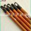 varnished wooden broom handle with long hanger