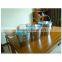 metal water bucket with wooden handle