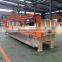fully automatic filter press with automatic filter cloth washing in separation technology inc