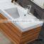 white matte resin basins, modern art above counter top basin