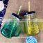 Hot selling products of glass drink pump lid 480ml colorful glass mason jar with handles wholesale
