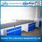 Steel frame laboratory work bench with sink and reagent shelf