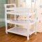 Solid wood baby diaper changing table toys storage shelf