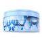Cute round tin container with clear window
