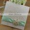 Luxury Elegant Ribbon and Brooch Decorated Flocked Wedding Invitation Cards                        
                                                Quality Choice