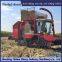 Corn harvester modified with triangular track wheels for anti slip in flooded areas