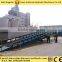 Container using loading lift table mobile hydraulic yard ramp