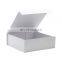 Customize logo printing white rigid folding magnetic flap clothing packaging gift box with ribbon