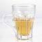 Clear machine made beer glass mug with handle