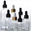 Cosmetic Manufacturer Essential Oil Vegetal Oil Clear Glass Dropper Bottle 10 Ml 20 Ml 30 Ml with Black Gold Silver Glass Pipette