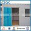 shipping container office with two windows and one door