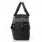 Black messenger bag with handle and front pocket