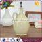 Beige round olive branch pattern ceramic oil and vinegar bottles wholesale