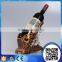 manufacturer supply customized resin imitated bronze liquor bottle holders