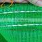 Durable construction debris scaffold safety net in roll with grommets