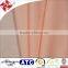 lithe frame in a nude pleated dress with cut-out panels fabric