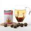 Premium grade individual wrapped blooming flower tea