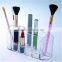 Acrylic brush holder with lid in cosmetic bags / cases