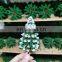 Architectural miniature plastic and iron wire model trees for model train scape layout