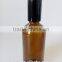 small round amber glass essential oil personal care glass bottle with cap